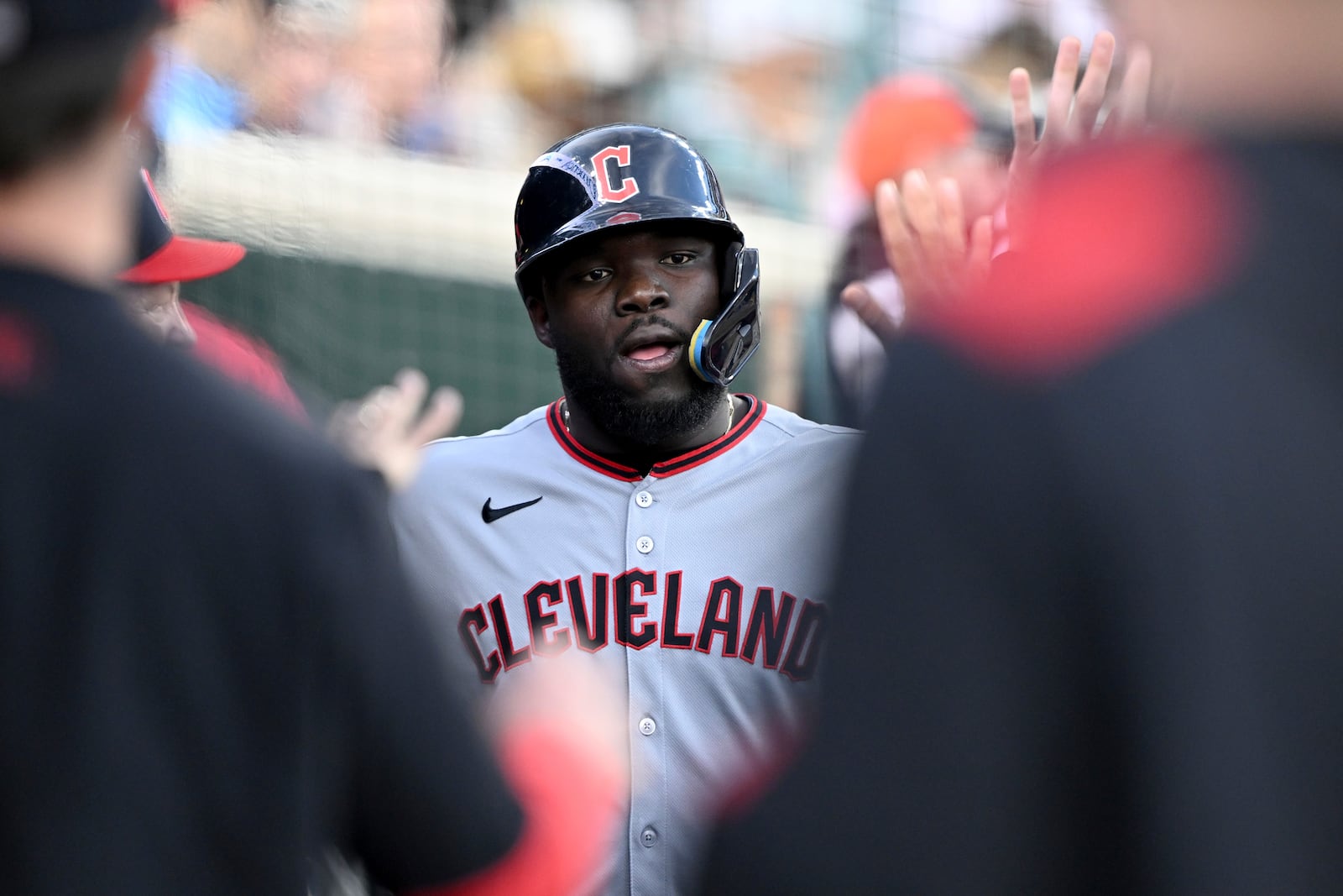 Cleveland Guardians' Jhonkensy Noel celebrates in the dugout after scoring a run against the Detroit Tigers in the third inning of a baseball game Saturday, May 24, 2025, in Detroit. (AP Photo/Lon Horwedel)