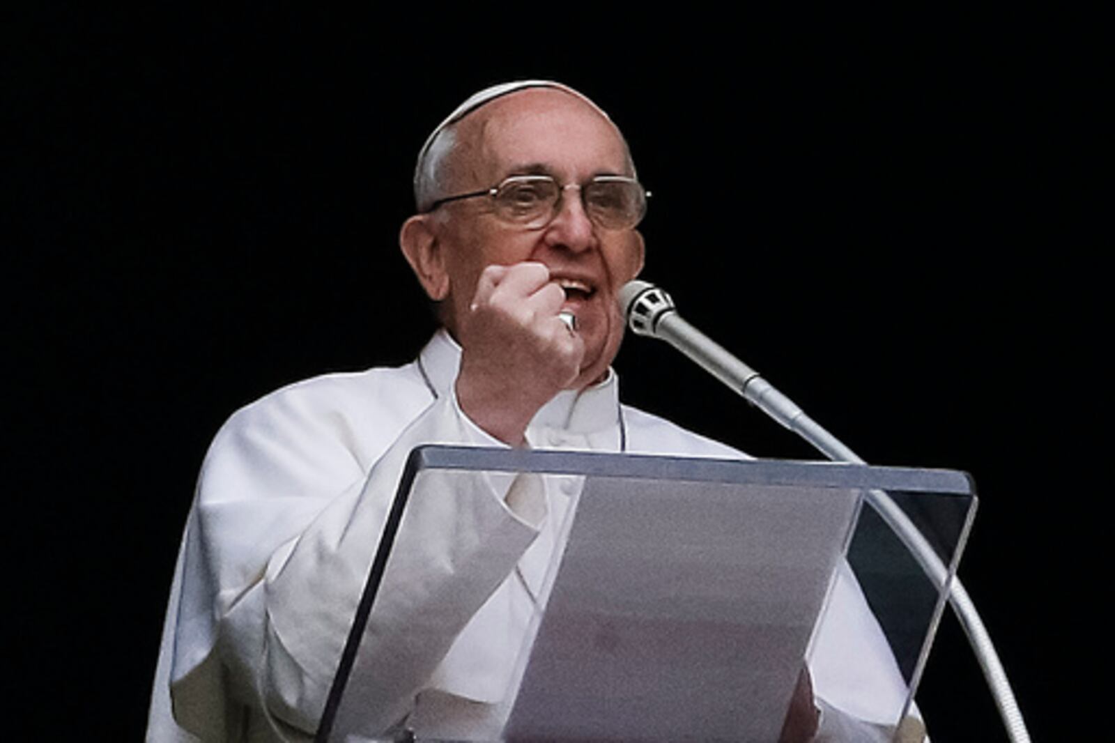 FILE - Pope Francis gestures as he delivers his Angelus prayer from the window of his studio overlooking St. Peter's Square, at the Vatican, Sunday, March 17, 2013. “In these days I’ve been able to read a book by a cardinal -- Cardinal Kasper, a good theologian -- about mercy. And this book has done me a lot of good, though don’t think I’m just doing publicity for my cardinals’ books! It’s not like that. But it’s done me so much good. Cardinal Kasper said that feeling mercy, this word changes everything. It’s the best thing we can feel: It changes the world. A bit of mercy makes the world less cold and more just.” (AP Photo/Gregorio Borgia, File)