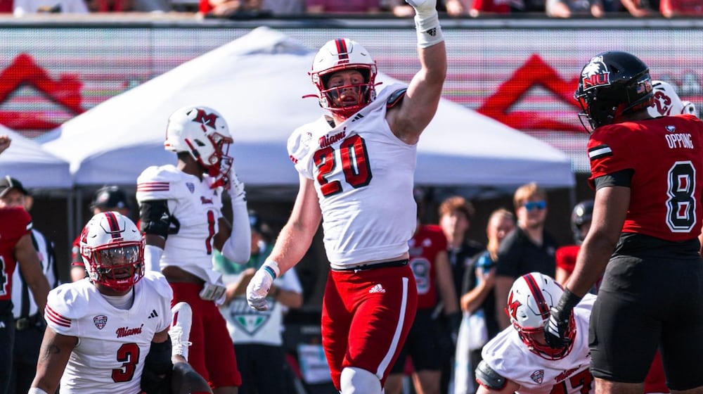 Miami's Adam Trick celebrates a tackle against Northern Illinois on Saturday in DeKalb, Ill. The RedHawks opened Mid-American Conference play with a 25-14 victory. MIAMI ATHLETICS PHOTO