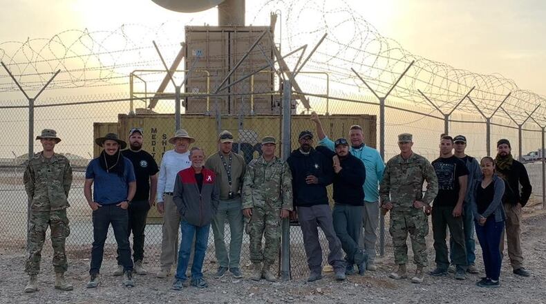 Air Force Research Laboratory’s THOR team, pictured with the portable counter-UAS system, capable of destroying drones at the speed-of-light, at long range, in its base defense mission. (AFRL courtesy photo)