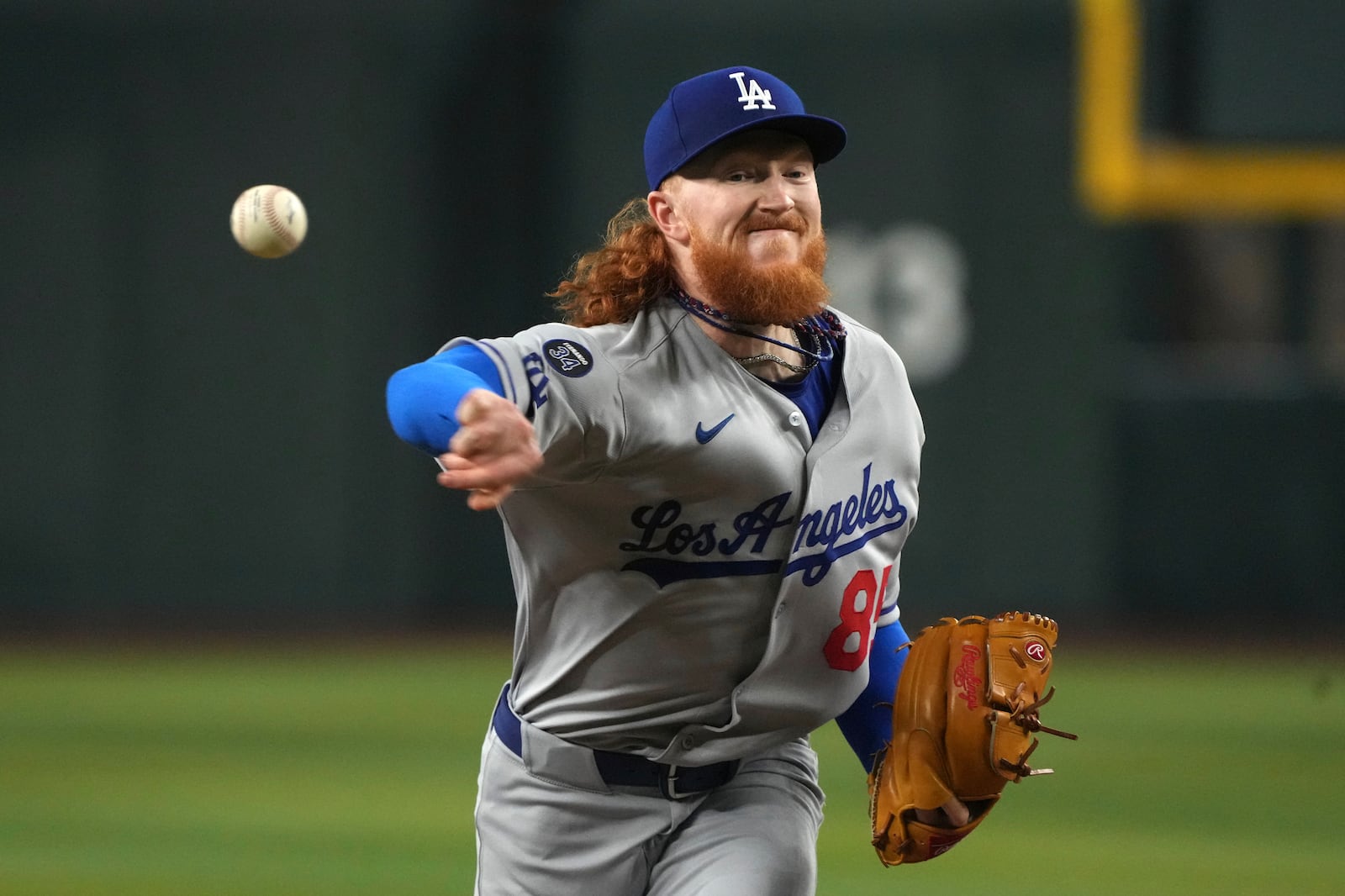 Los Angeles Dodgers pitcher Dustin May throws against the Arizona Diamondbacks in the first inning during a baseball game, Saturday, May 10, 2025, in Phoenix. (AP Photo/Rick Scuteri)