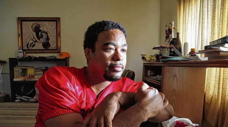 Steven Jackson II of Trotwood regularly pawns his possessions when he needs money. He has a video gaming system, jewelry and televisions at the pawn shop. Staff photo by Lisa Powell