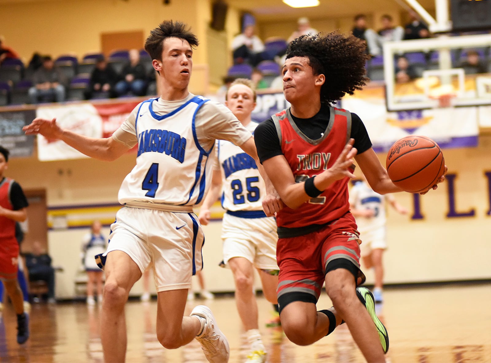 Troy's Malakyi Hall makes a strong move to the basket during during their Division II district semifinal game against Miamisburg on Monday, March 2, 2026 at the Vandalia Butler Student Activity Center. GEOFF NEVILLE / CONTRIBUTED PHOTO