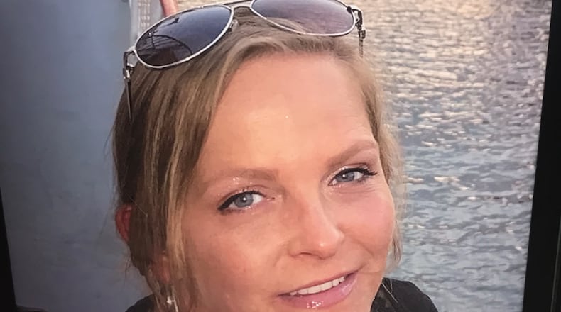 One of the last photos of 42-yearold Becca Green, taken when she and her husband Nate, the former University of Dayton basketball stalwart, were on an Ohio River cruise from Cincinnati. CONTRIBUTED