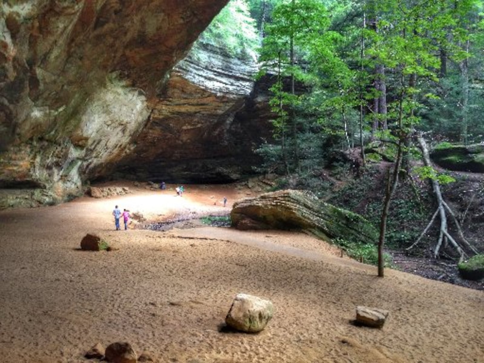 While the Hocking Hills State Park is beautiful any time of year, with its scenic waterfalls and caves, many additional activities are offered in the warmer months. Park goers can enjoy horseback riding, ziplining, canoeing, and other activities in the area.