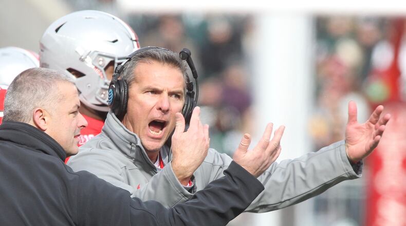 Ohio State’s Urban Meyer shouts to his players during a game against Michigan State on Saturday, Nov. 11, 2017, at Ohio Stadium in Columbus. David Jablonski/Staff