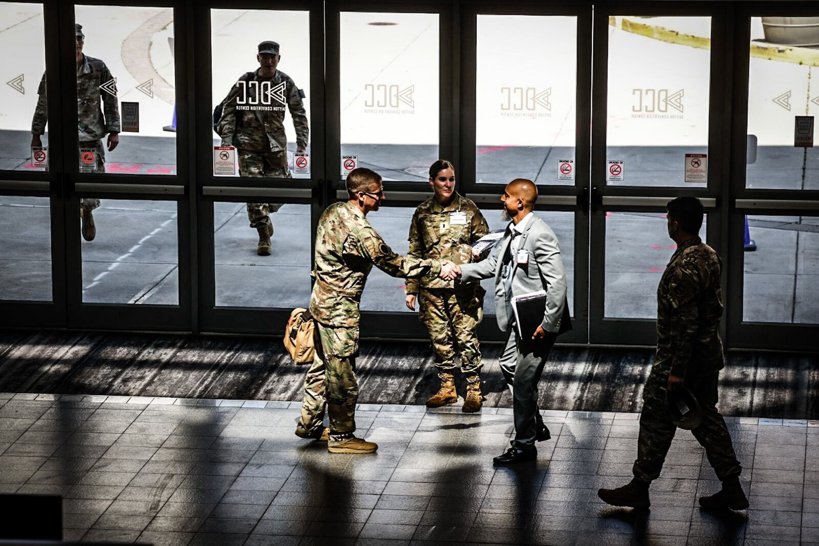 Airmen meet and greet people from the defense industry who are attending the Life Cycle Industry Days at the Dayton Convention Center.