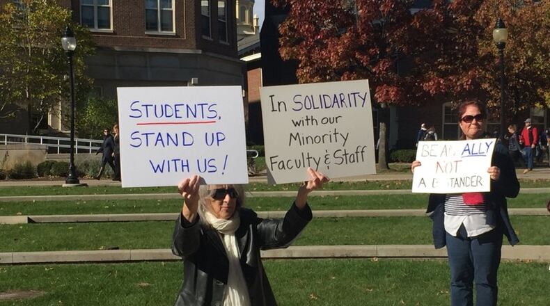 Faculty and staff at the University of Dayton protested what they characterized as the mistreatment of minority faculty and students they say has occurred in the days after the presidential election. Faculty also hosted a teach-in to address concerns of discrimination and the election’s impact. MAX FILBY / STAFF