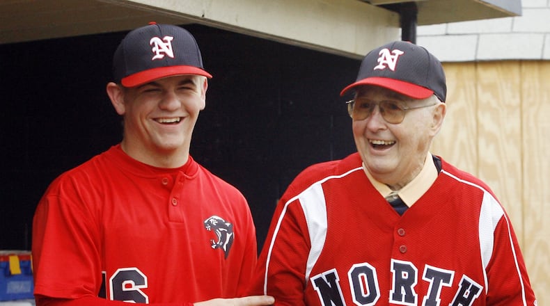 North baseball player Justin Williams and Don Henderson, one of two coaches in North baseball history, share a laugh during a game against Northwestern in the Panther Classic Saturday, April 12, 2008. Staff Photo by Barbara J. Perenic