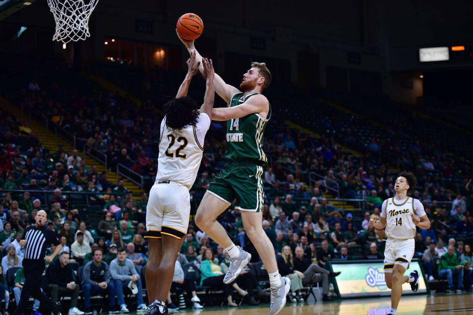 Wright State's Brandon Noel shoots over Northern Kentucky's Michael Bradley during a game at the Nutter Center. Joe Craven/WSU Athletics