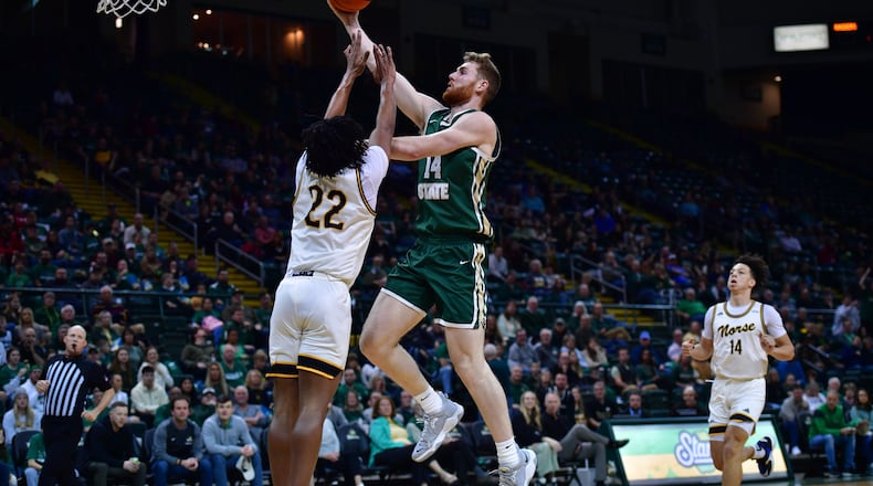 Wright State's Brandon Noel shoots over Northern Kentucky's Michael Bradley during a game last week at the Nutter Center. Joe Craven/WSU Athletics