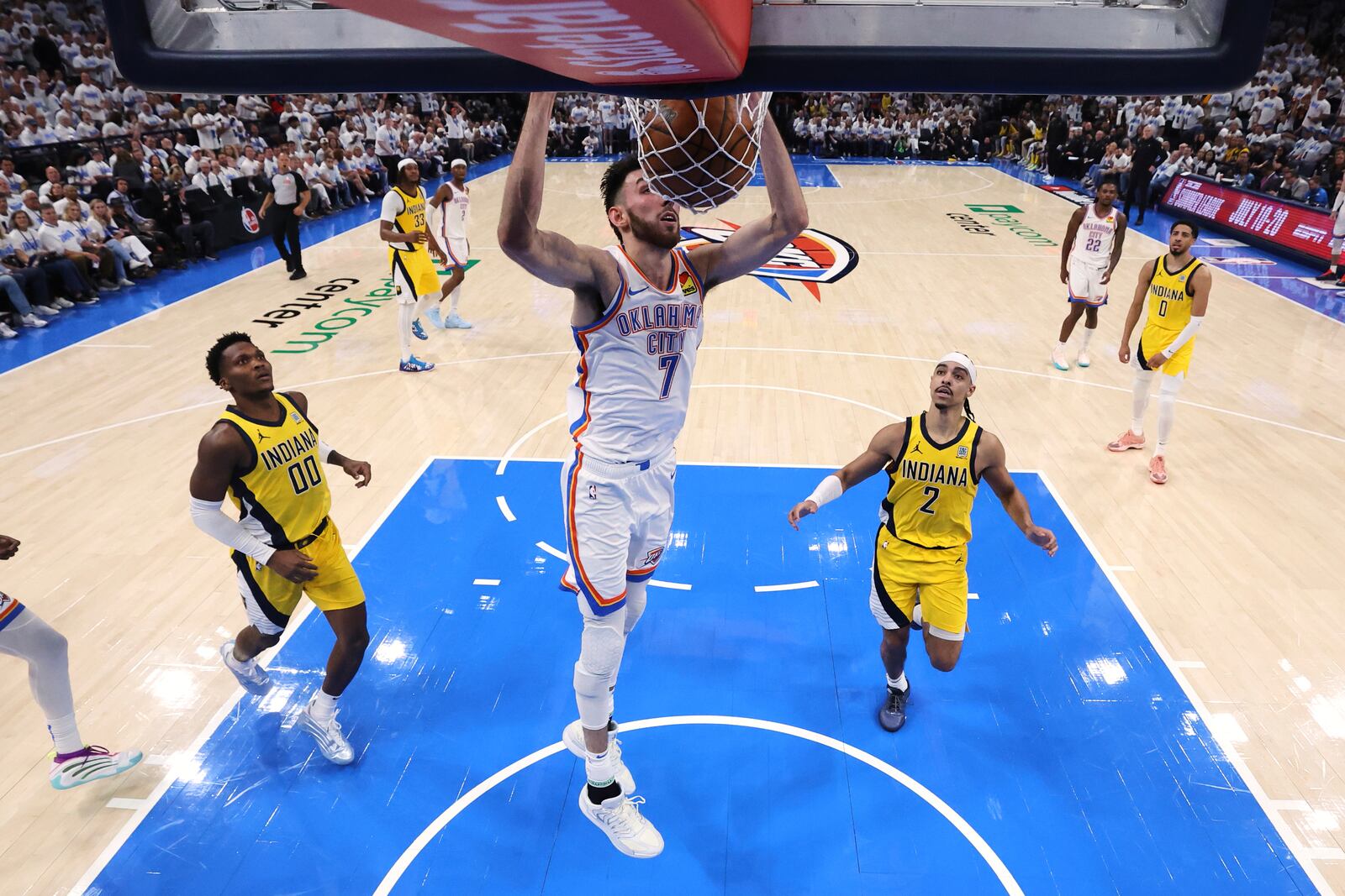 Oklahoma City Thunder forward Chet Holmgren (7) dunks during the second half in Game 1 of the NBA Finals basketball series against the Indiana Pacers Thursday, June 5, 2025, in Oklahoma City. (Matthew Stockman/Pool Photo via AP)