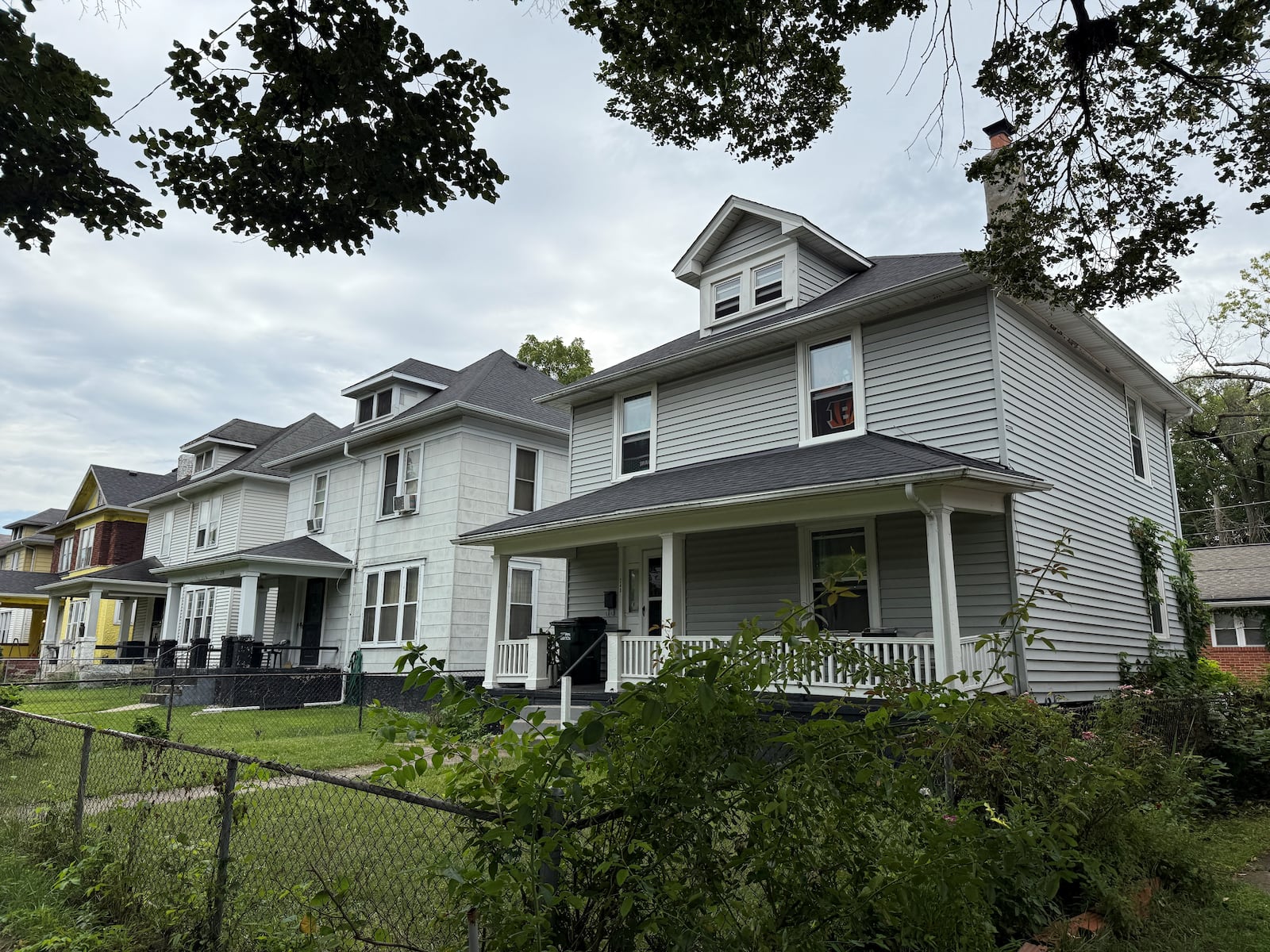 The city of Dayton issued a civil penalty warning to this home for alleged housing code violations. CORNELIUS FROLIK / STAFF