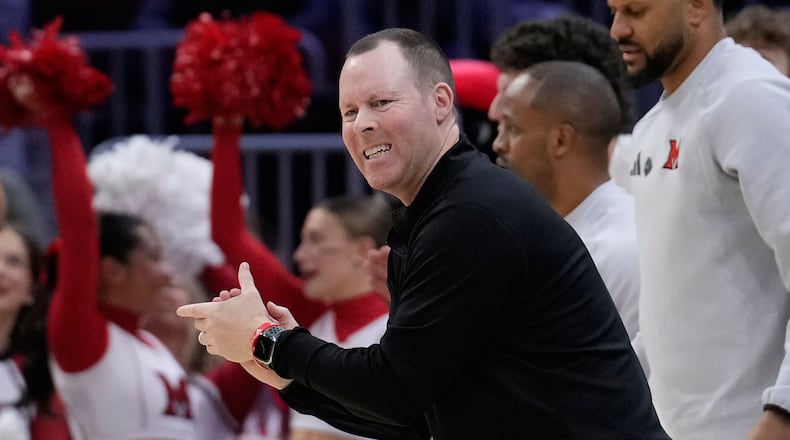 Miami (Ohio) head coach Travis Steele on the sidelines in the first half of a basketball game against Massachusetts in the quarterfinals of the Mid-American Conference tournament, Thursday, March 12, 2026, in Cleveland. (AP Photo/Sue Ogrocki)