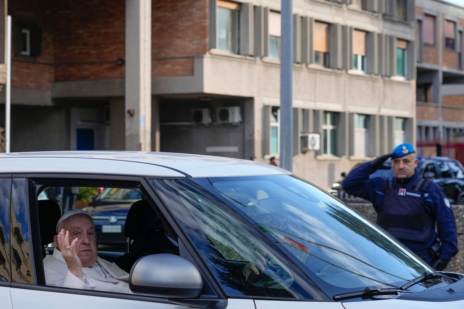 FILE - Pope Francis leaves the Rebibbia Prison where he symbolically opened a Holy Door with inmates in Rome, Thursday, Dec. 26, 2024. (AP Photo/Gregorio Borgia, file)