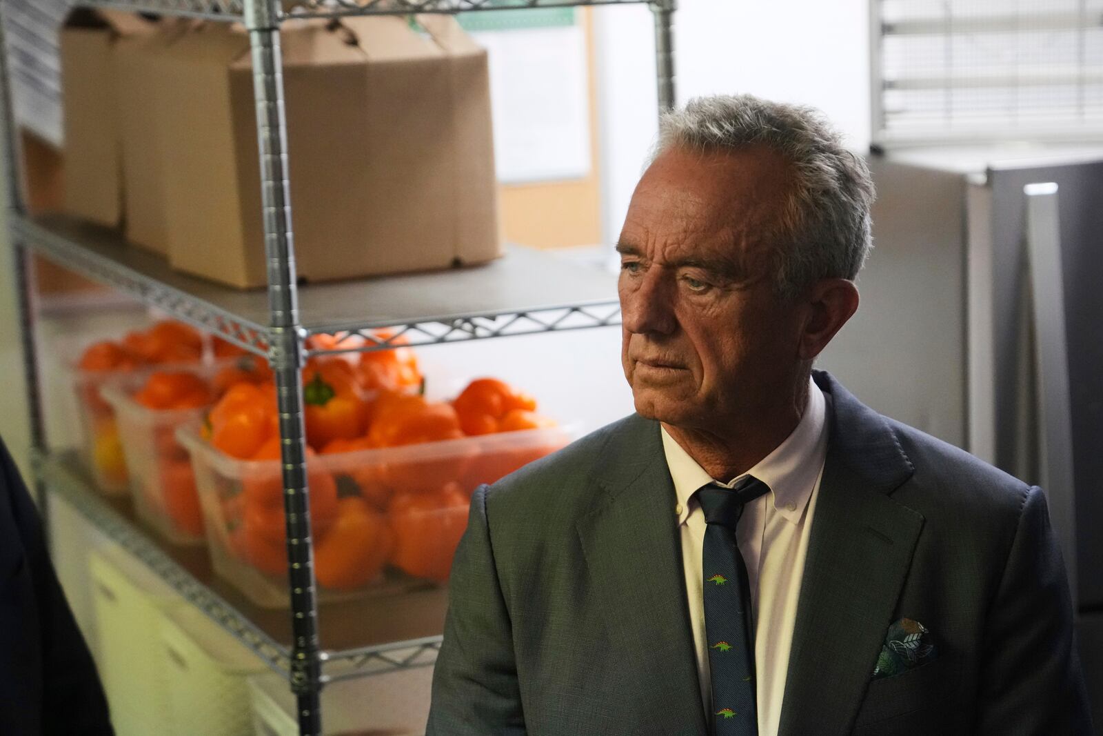 U.S. Health Secretary Robert F. Kennedy Jr. tours the Native Health Mesa Food Distribution Center in Mesa, Ariz., Tuesday, April 8, 2025. (AP Photo/Ross D. Franklin)