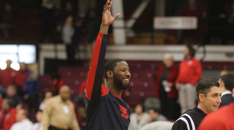 Dayton’s Scoochie Smith smiles before a game against Fordham on Jan. 31, 2017, at UD Arena. David Jablonski/Staff