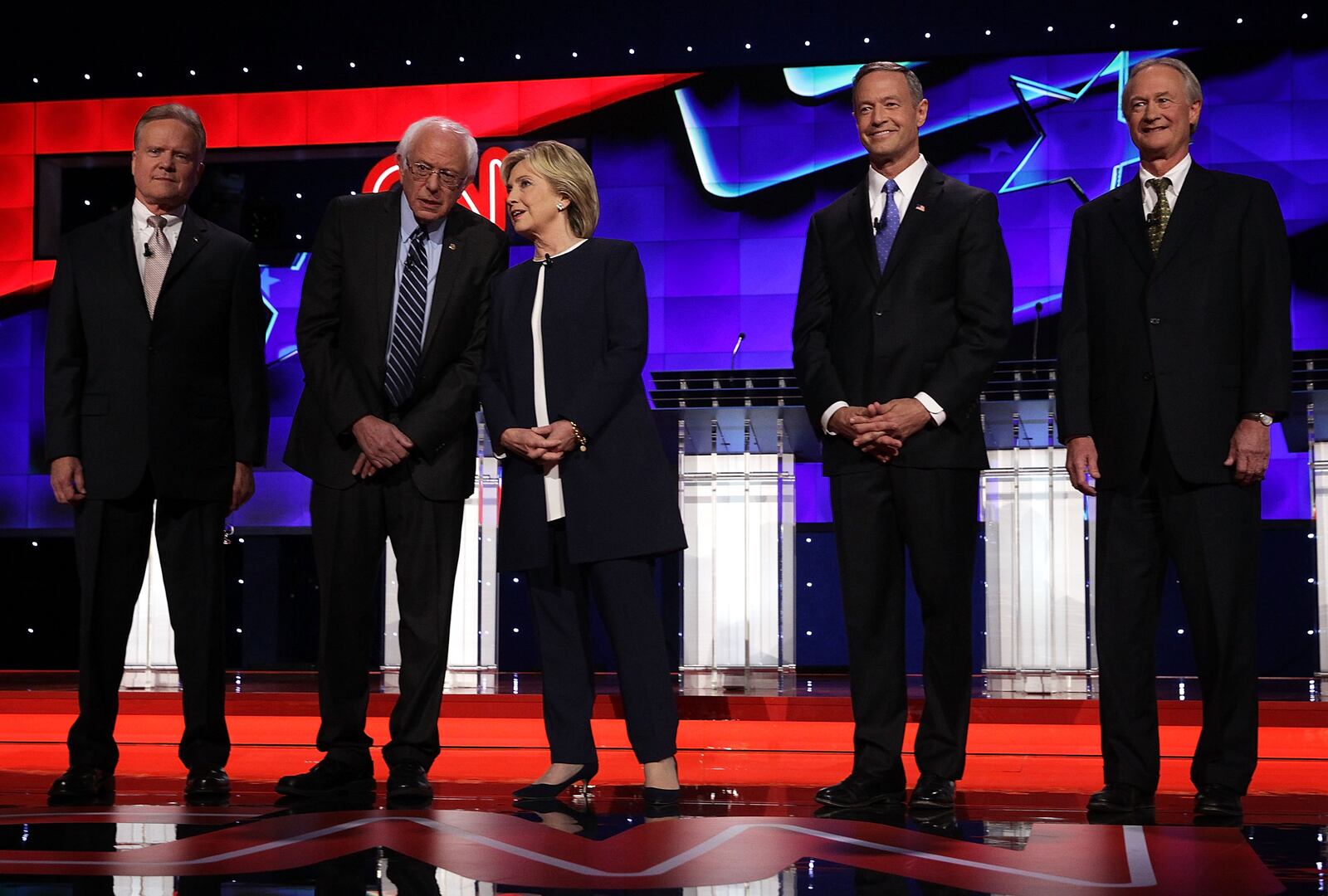 LAS VEGAS, NV - OCTOBER 13: (L-R) Democratic presidential candidates Jim Webb, Sen. Bernie Sanders (I-VT), Hillary Clinton, Martin O'Malley and Lincoln Chafee take the stage for a Democratic presidential debate sponsored by CNN and Facebook at Wynn Las Vegas on October 13, 2015 in Las Vegas, Nevada. The five candidates are participating in the party's first presidential debate. (Photo by Alex Wong/Getty Images)