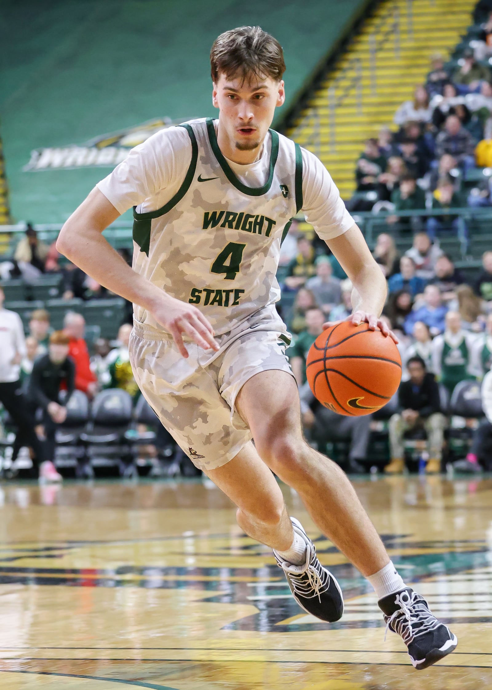 Wright State freshman forward Kellen Pickett dribbles during a Horizon League game against Youngstown State on Thursday, Jan. 15 at Ervin J. Nutter Center in Fairborn. BRYANT BILLING/STAFF