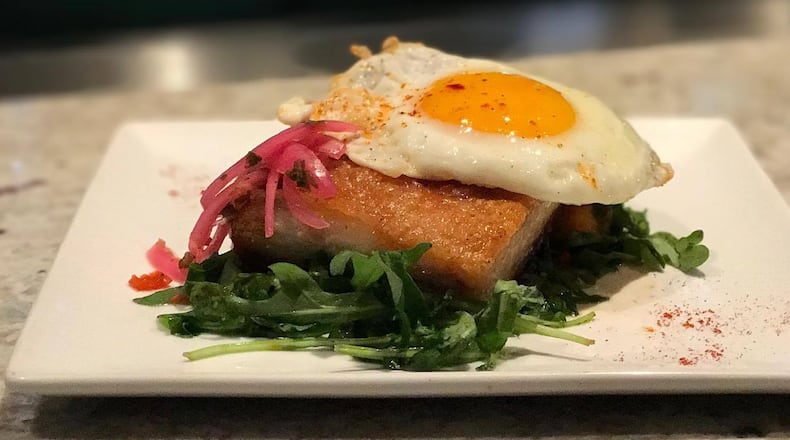 The pork belly at Salar is a crowd favorite. Photo: Salar