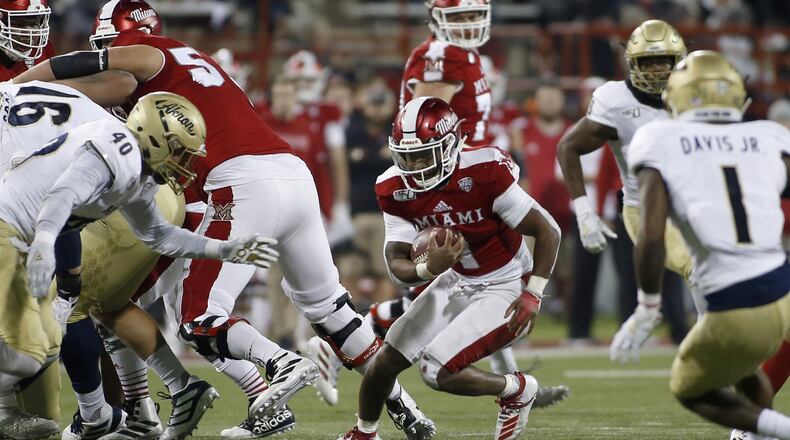 OXFORD, OHIO - NOVEMBER 20: Jaylon Bester #1 of the Miami of Ohio Redhawks runs the ball during the second quarter against the Akron Zips at Yager Stadium on November 20, 2019 in Oxford, Ohio. (Photo by Justin Casterline/Getty Images)