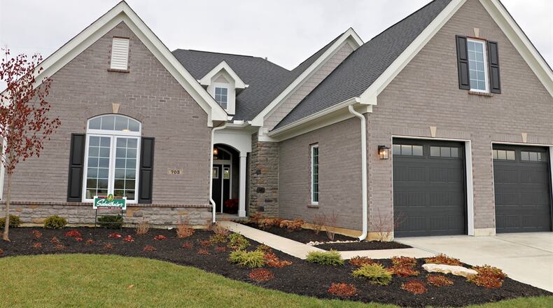 Listed for $674,900 by Coldwell Banker Heritage, the plank and stone, ranch-style home at 703 Doral Court has about 2,764 square feet of living space. Contributed photos by Kathy Tyler