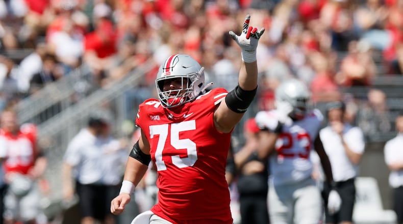 Ohio State offensive lineman Carson Hinzman celebrates a touchdown during their NCAA college football Spring game Saturday, April 15, 2023, in Columbus, Ohio. (AP Photo/Jay LaPrete)