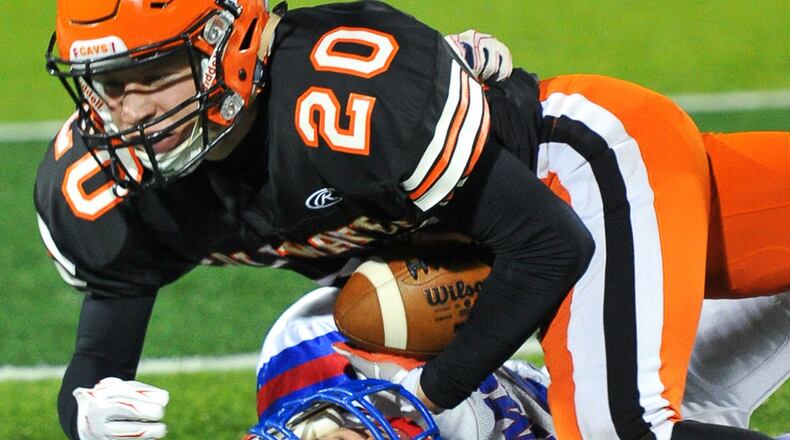 Greeneview’ David VanHorn (bottom) brings down Coldwater’s Nate Rindler (top) during a Div. V, Region 20 semifinal game on Saturday, November 12, 2016 at Sidney Memorial Stadium. Contributed Photo by Bryant Billing