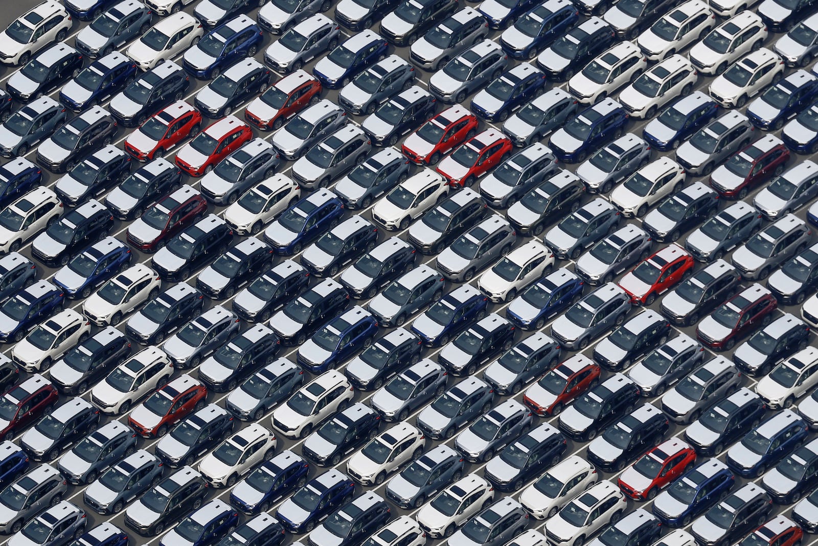 This photo shows vehicles bound for foreign countries at a logistics center in Kawasaki near Tokyo, Thursday, March 27, 2025. (Michi Ono/Kyodo News via AP)
