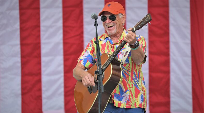 WEST PALM BEACH, FLORIDA - NOVEMBER 03: Jimmy Buffett plays a song as he performs at a Get Out the Vote rally for U.S. Senator Bill Nelson (D-FL) and Florida Democratic governor candidate Andrew Gillum at the Meyer Amphitheatre on November 03, 2018 in West Palm Beach, Florida. Mr. Buffett was encouraging people to vote for Sen. Nelson and Mayor Gillum who are in tight races against their Republican opponents. (Photo by Joe Raedle/Getty Images)