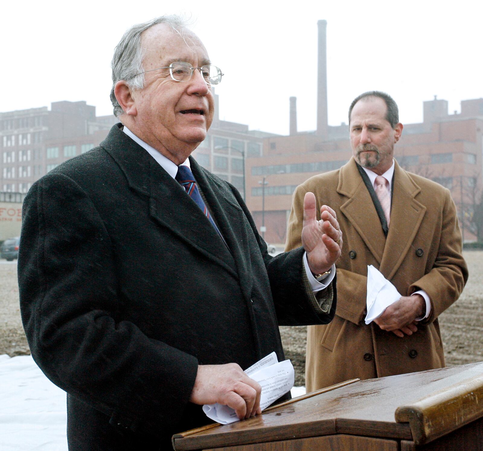 U.S. Representative Dave Hobson (R-Oh.) speaks at groundbreaking for the Springfield Surgical Group at the building site on West Main Street Thursday.  Standing at his right is Richard Nedelman, M.D., a member of the Surgical Association of Springfield who led the event.
Staff Photo by Barbara J. Perenic