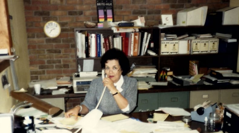 Ivy Schuerholz is busy at her desk, working for the business that started in the basement of her home in 1974.  CONTRIBUTED