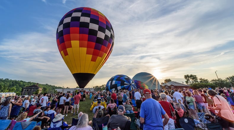 The City of West Carrollton hosted a hot air balloon glow by the Askren Air Balloon Team with food trucks, beer and a concert featuring The Fries Band on Friday, July 12, 2024 at 1 S. Elm St. TOM GILLIAM / CONTRIBUTING PHOTOGRAPHER