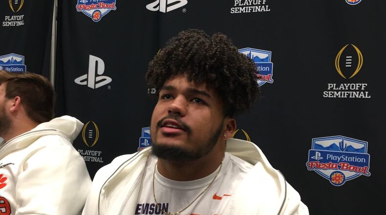Jackson Carman meets with the media during Fiesta Bowl preparations Thursday.