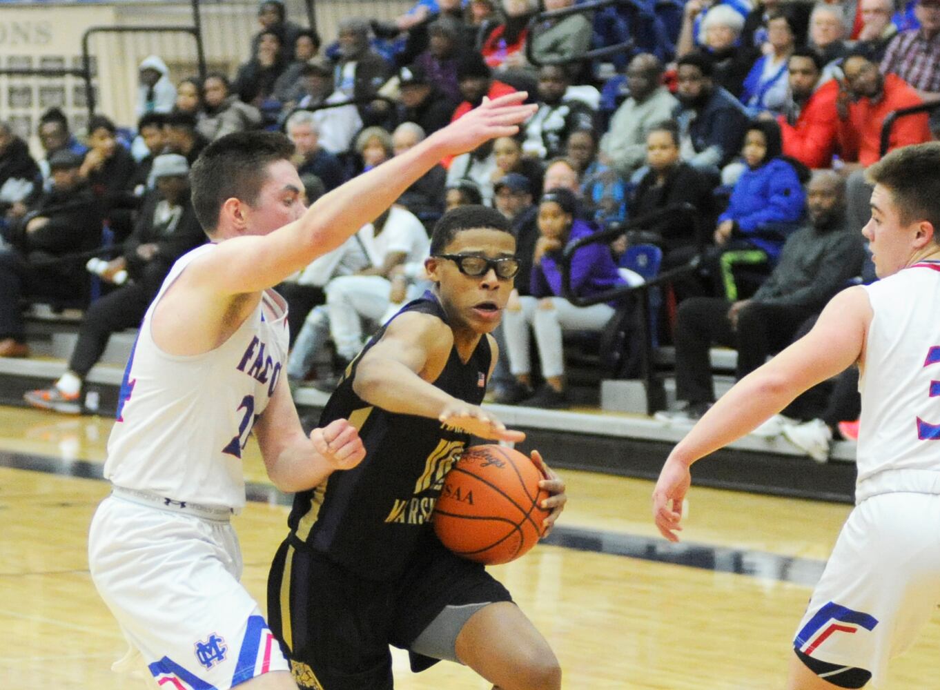PHOTOS: Thurgood Marshall vs. Clinton-Massie boys basketball