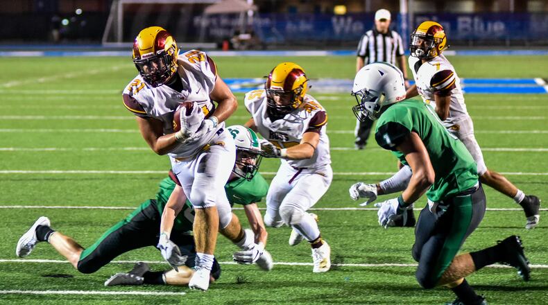 Ross running back Jackson Gifford carries the ball in for a touchdown during their season opener football game against Badin Friday, August 30, 2019 at Hamilton’s Virgil Schwarm Stadium. Ross won 20-19 in overtime. NICK GRAHAM/STAFF