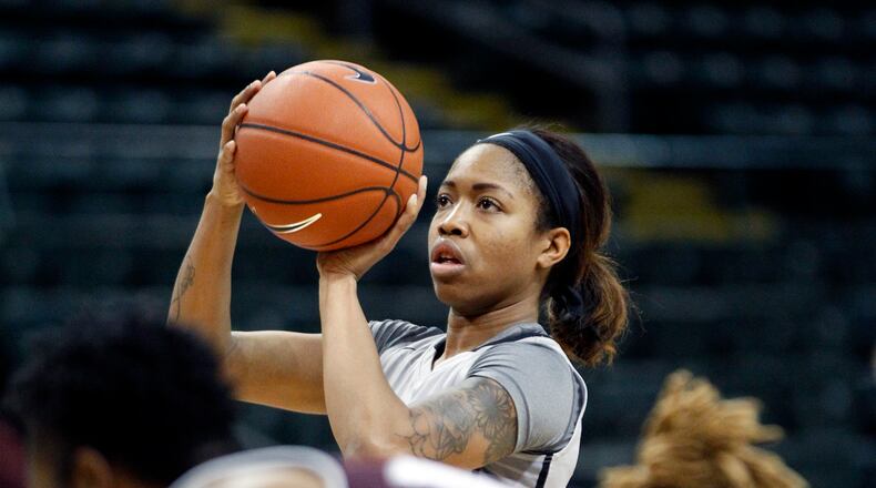 Chelsea Welch shoots during a game earlier this season. TY GREENLEES / STAFF