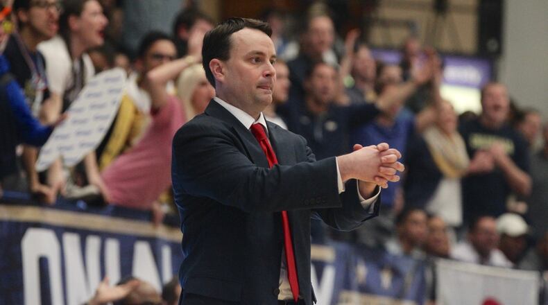 Dayton’s Archie Miller calls a play during a game against George Washington on March 4, 2017, at the Smith Center in Washington, D.C. David Jablonski/Staff