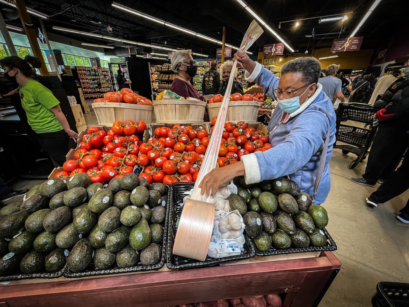 Sheila Jenkins from Trotwood siad, "I've been watching it for a year and I wanted to be a part of the opening." Gem City Market on Salem opened it's doors at 12pm Wednesday afternoon May 12, 2021."being here says it can be done," she added. JIM NOELKER/STAFF.  



 JIM NOELKER/STAFF