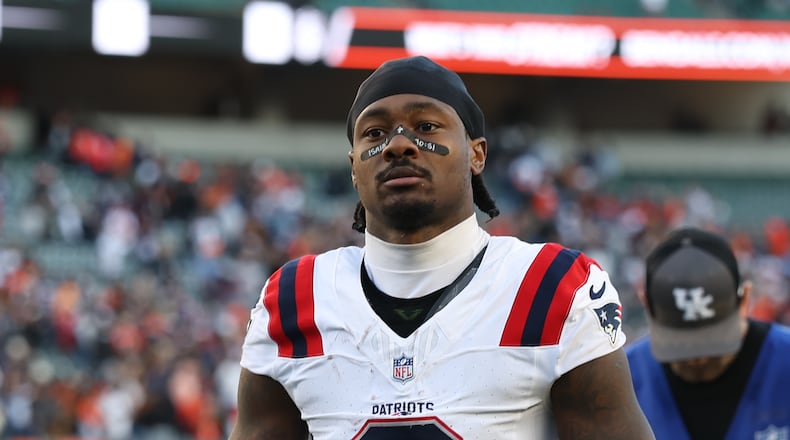 FILE - New England Patriots wide receiver Stefon Diggs (8) leaves the field following an NFL football game against the Cincinnati Bengals, Sunday, Nov 23, 2025, in Cincinnati, Ohio. (AP Photo/Peter Joneleit, File)