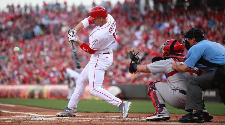 The Reds' Joey Votto doubles in the first inning against the Cardinals on Tuesday, Aug. 2, 2016, at Great American Ball Park in Cincinnati. David Jablonski/Staff