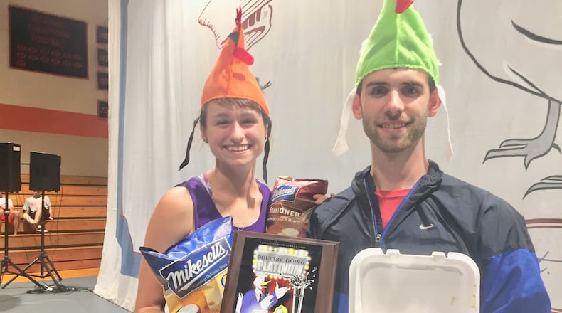 Ryan Stoneberger pictured with his fiancée after purchasing the One Millionth chicken dinner at Poultry Days in Versailles