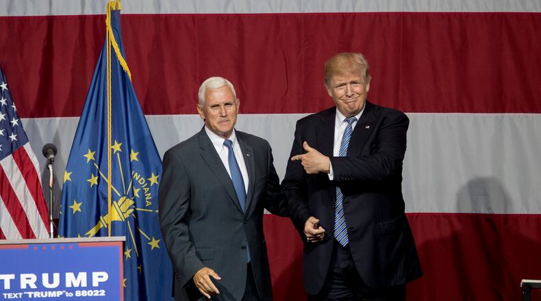 WESTFIELD, IN - JULY 12: Republican presidential candidate Donald Trump greets Indiana Gov. Mike Pence at the Grand Park Events Center on July 12, 2016 in Westfield, Indiana. Trump is campaigning amid speculation he may select Indiana Gov. Mike Pence as his running mate. (Photo by Aaron P. Bernstein/Getty Images)