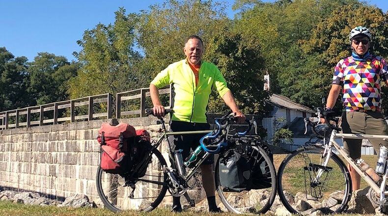 The riders are pictured at the locks at Lockington, near Piqua, during their ride from Cincinnati to Toledo in early October. Contributed photo