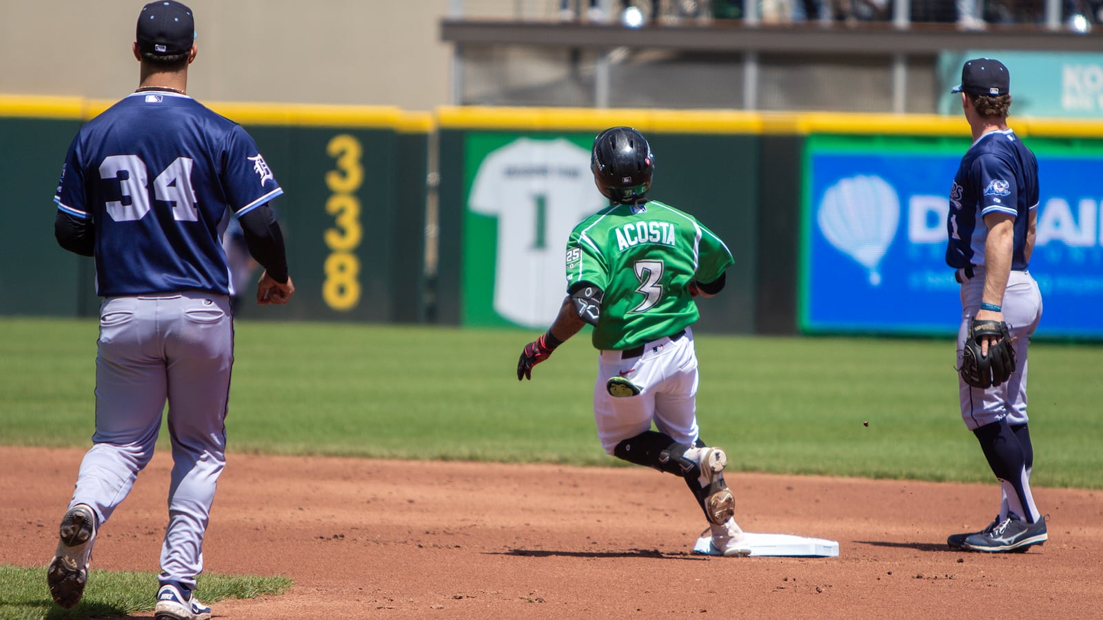 Dayton's Victor Acosta pulls into second base with the first of two doubles hit in Sunday's game at Day Air Ballpark. Jeff Gilbert/CONTRIBUTED
