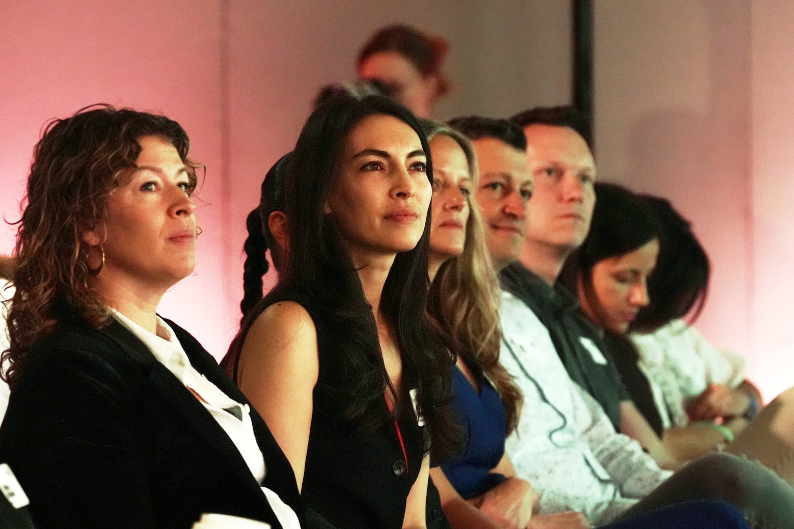 Attendees listen during the opening session of The Elevate Prize Foundation's Make Good Famous Summit, Tuesday, May 13, 2025, in Miami Beach, Fla. (AP Photo/Marta Lavandier)