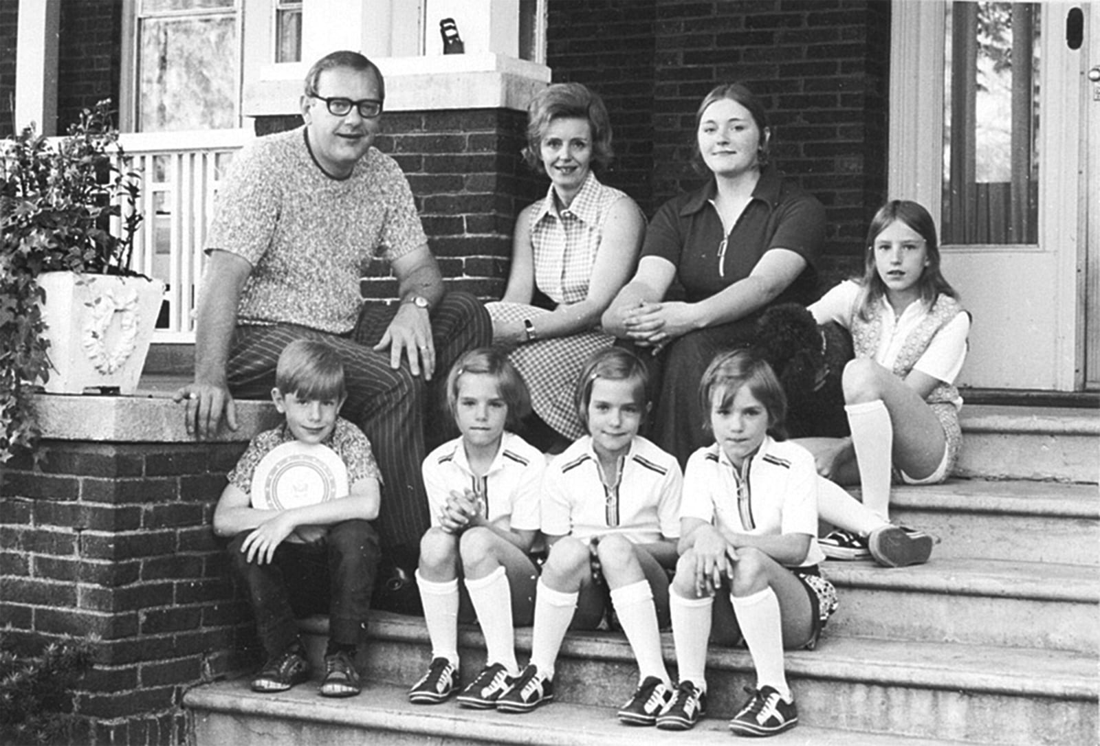 FILE - The Ryan family sits on the porch of their Kankakee, Ill., home in 1970. Back row from left are George; wife, Lura Lynn, and daughters, Nancy and Lynda. Front row are son, George Jr., and triplet daughters Julie, Joanne and Jeanette. (AP Photo/The (Kankakee) Daily Journal, File)