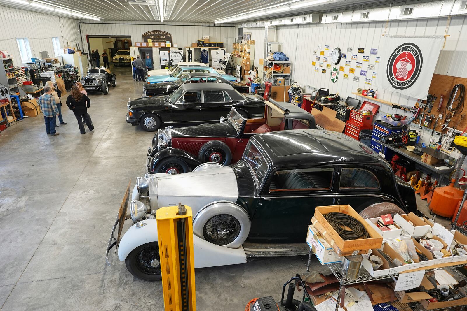 Volunteers gather at The Rolls-Royce Foundation in Mechanicsburg, Pa., Saturday, April 5, 2025. (AP Photo/Matt Rourke)