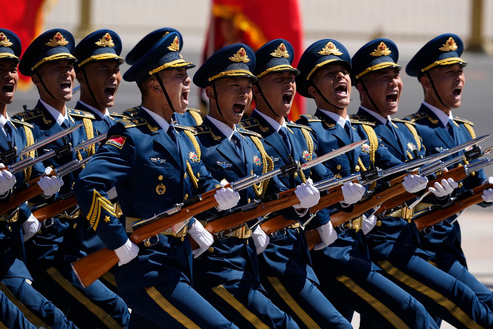 Chinese honor guards march during a welcome ceremony attended by China's President Xi Jinping and Kenyan President William Ruto at the Great Hall of the People in Beijing Thursday, April 24, 2025. (Iori Sagisawa/Pool Photo via AP)