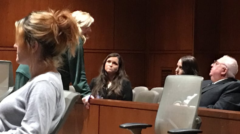 Amanda Palmgren, at right, listened during the latest hearing for Mercedes Robb, accused of murdering her fiancee, Jason Robb. Staff photo by Lawrence Budd